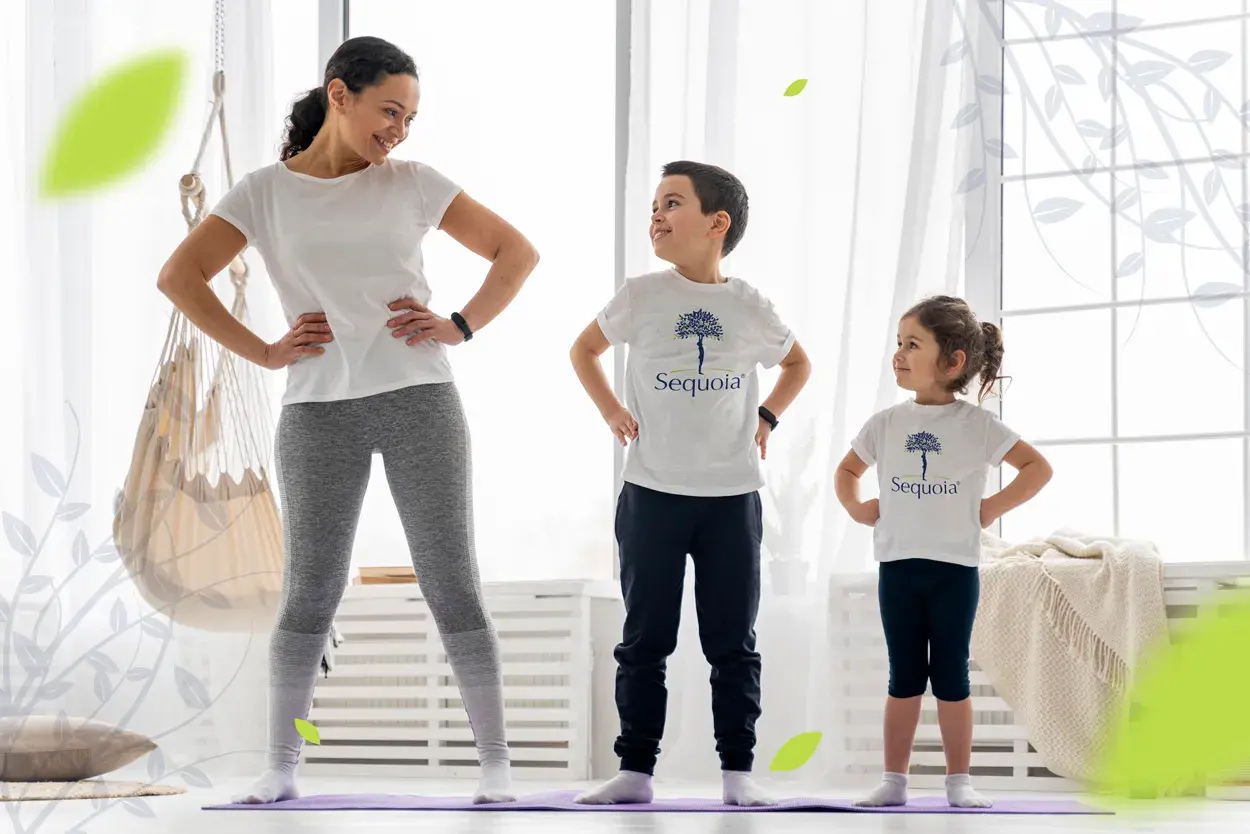 madre e hijos haciendo yoga